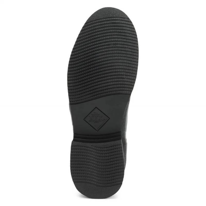 Muckboot Colt Ryder Boots have a black ridged rubber sole with a diamond-shaped center logo.
