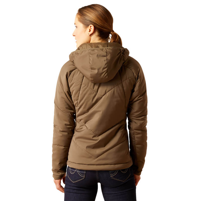 Woman in Ariat Womens Zonal Insulated Jacket Canteen with hands in pockets, standing and smiling.
