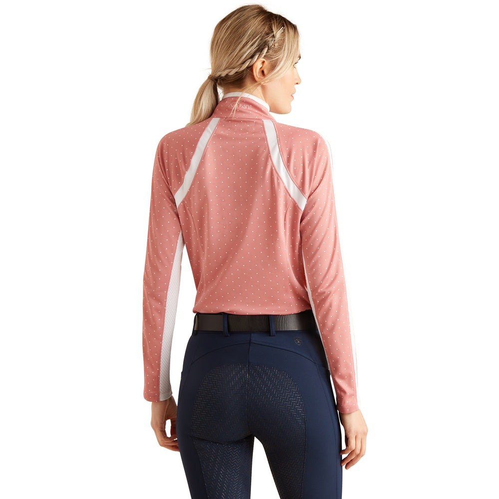 Woman in Ariat Sunstopper 3.0 Slate/Rose Dot and navy riding pants, seen from behind.