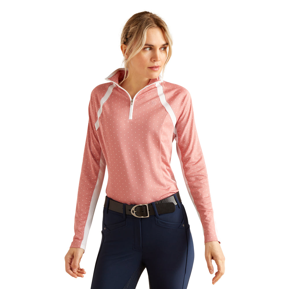 Woman in Ariat Sunstopper 3.0 Slate/Rose Dot baselayer, looking sideways.