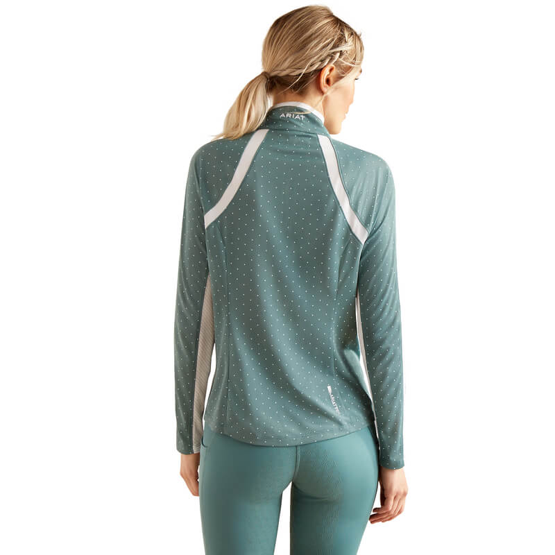 Woman in an Ariat Womens Sunstopper 3.0 Baselayer North Atlantic Dot and matching leggings.