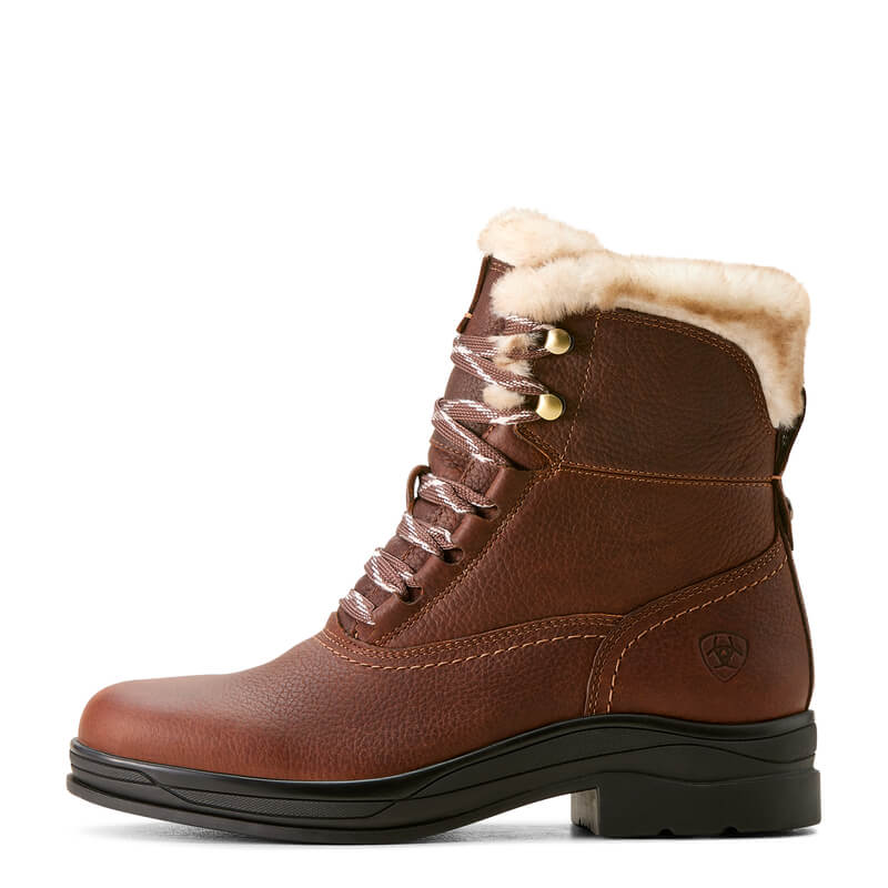 Ariat Harper Sherpa H2O Boots in dark brown with faux fur lining and black sole, side view.