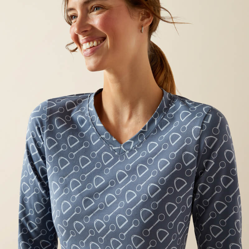 Smiling woman in an Ariat China Blue Hardware Print Long Sleeve T-Shirt.
