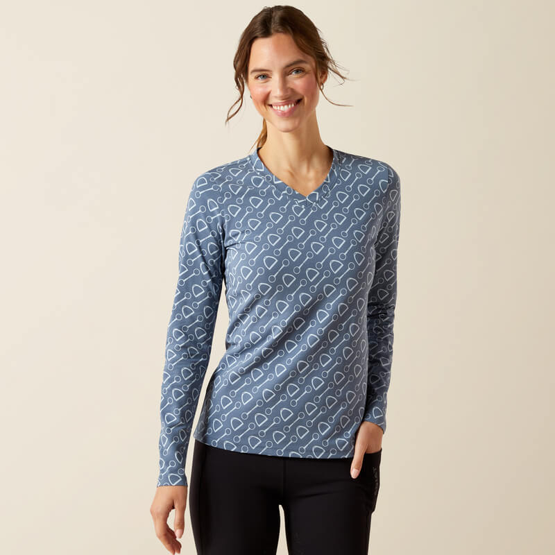 Smiling woman in Ariat Womens Hardware Print Long Sleeve T-Shirt, China Blue, facing camera.