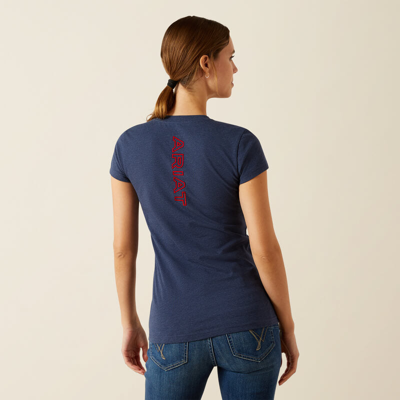 Woman in Ariat Womens BV Logo T-Shirt Navy Heather stands against a plain, light background.