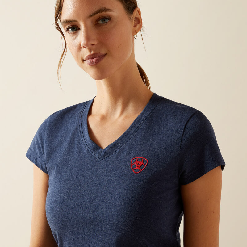Woman in an Ariat Womens BV Logo T-Shirt Navy Heather, looking at the camera.