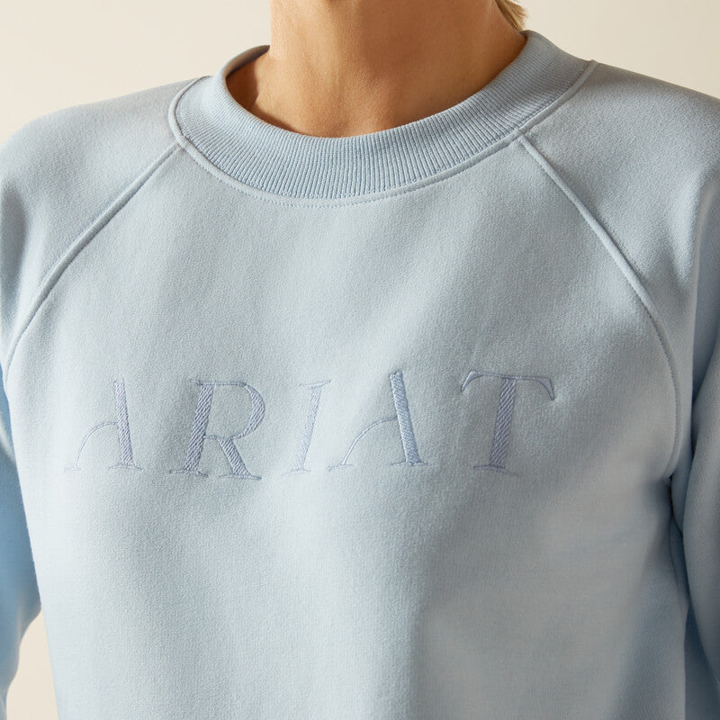 Wearing the Ariat Womens Martine Sweatshirt Skyway by Ariat for soft comfort.