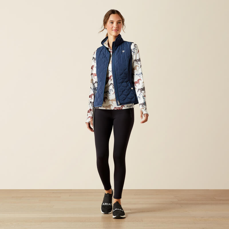Woman in an Ariat Ashley 2.0 Insulated Vest Big Dipper, smiling confidently.