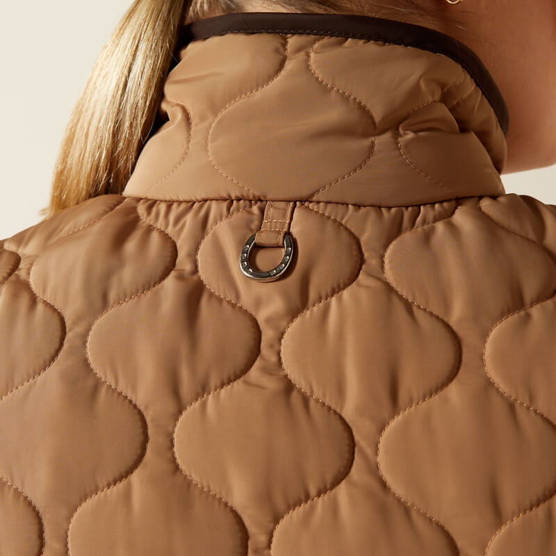 Close-up of Ariat Womens Ashley 2.0 Insulated Vest Tiger's Eye with metal ring at collar.