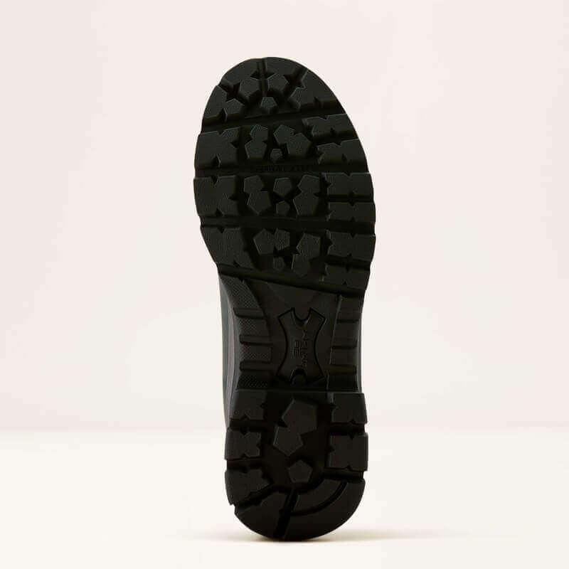 Deep navy Ariat Woodstock boot sole with deep treads, shown bottom-up on white background.