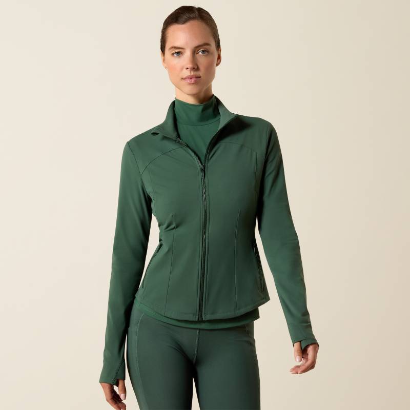 Woman in an Ariat Womens Solveil Full Zip Monstera jacket and leggings against a light background.