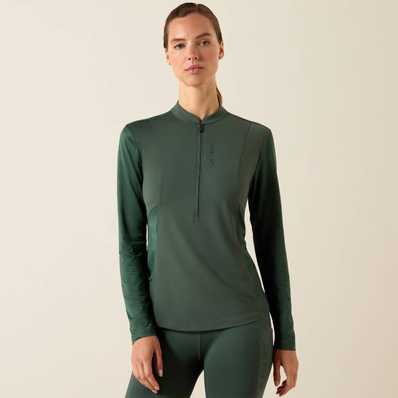 Woman wearing a dark green Ariat Womens Breathe 1/2 Zip Baselayer Monstera, facing forward.