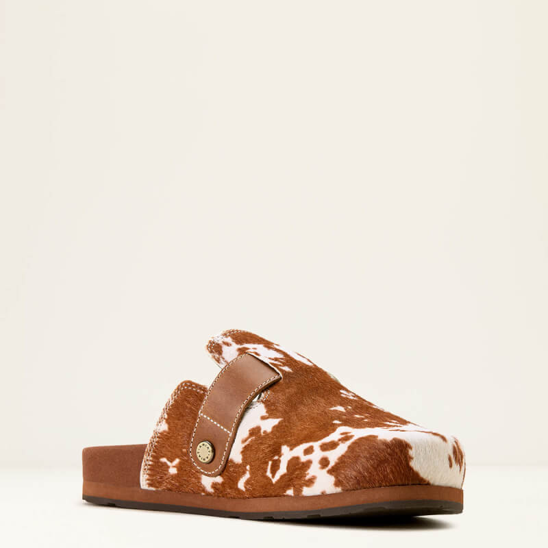 Ariat Country Mule Cow Hair On: women’s slip-on in brown/white cow-print with strap/button.