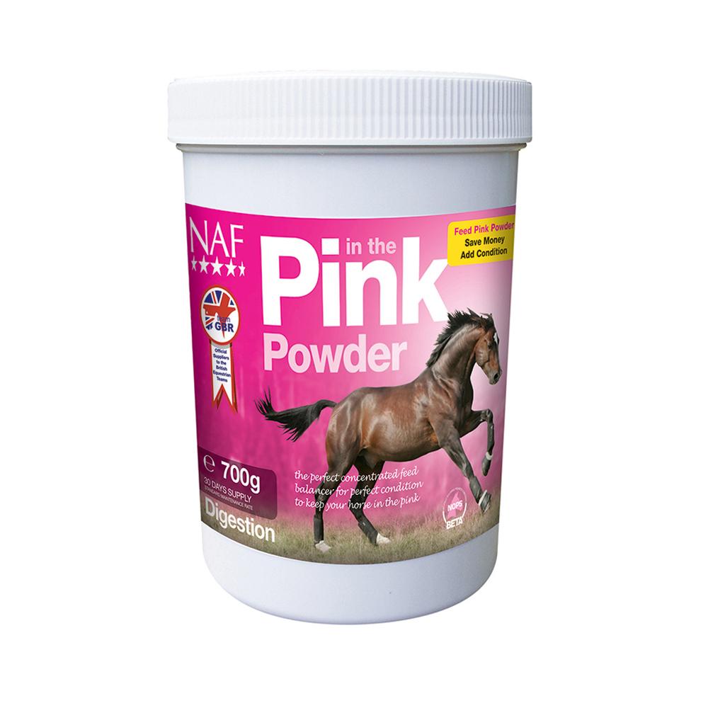 A tub of NAF In The Pink Powder horse supplement with a galloping horse on a pink label.