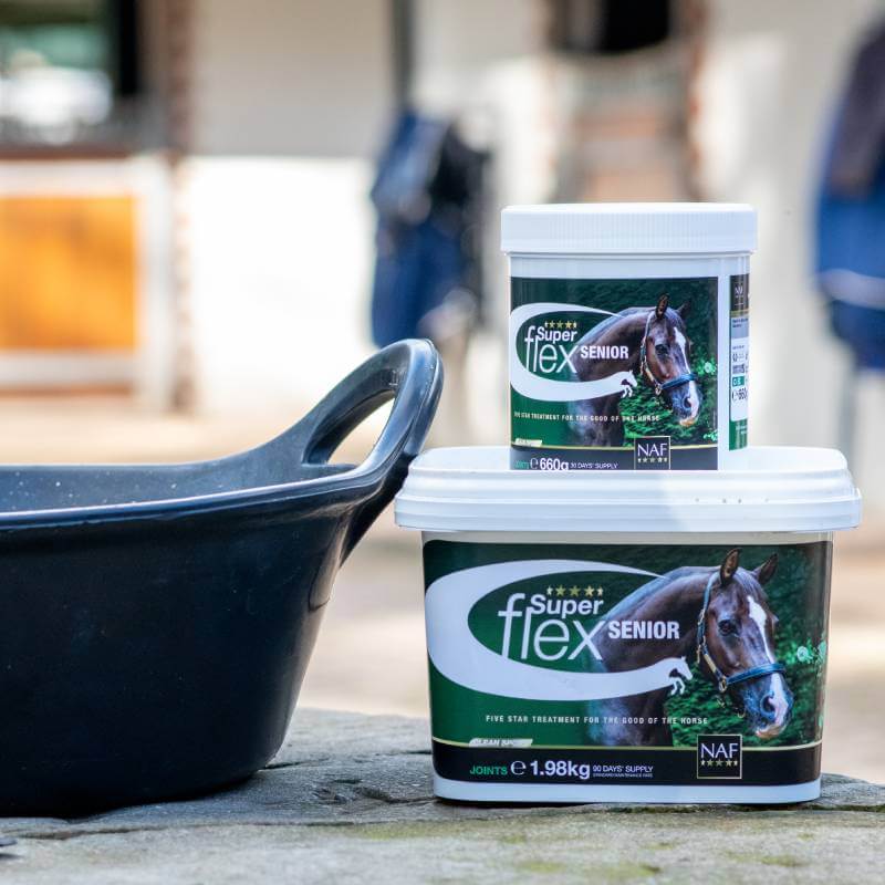 Two NAF Superflex Senior tubs for joint support placed next to a black feed tub.