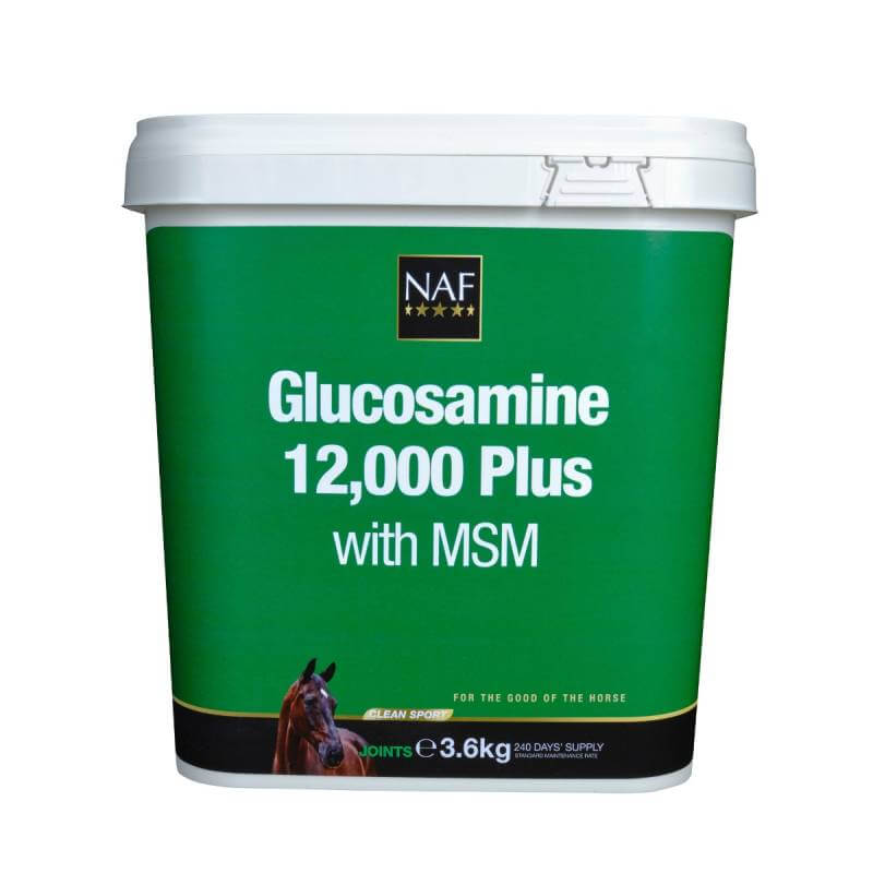 Two green tubs of NAF Glucosamine 12000 Plus MSM for horses on a bed of straw.