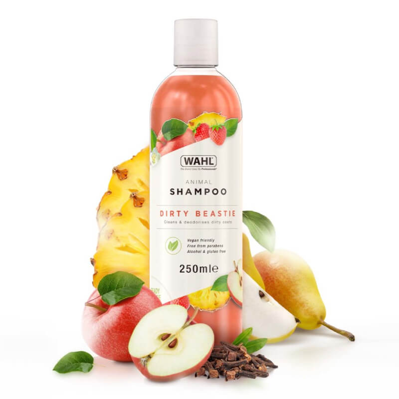 Wahl Dirty Beastie Shampoo 250ml with apple, pear, pineapple, and clove surrounding it.