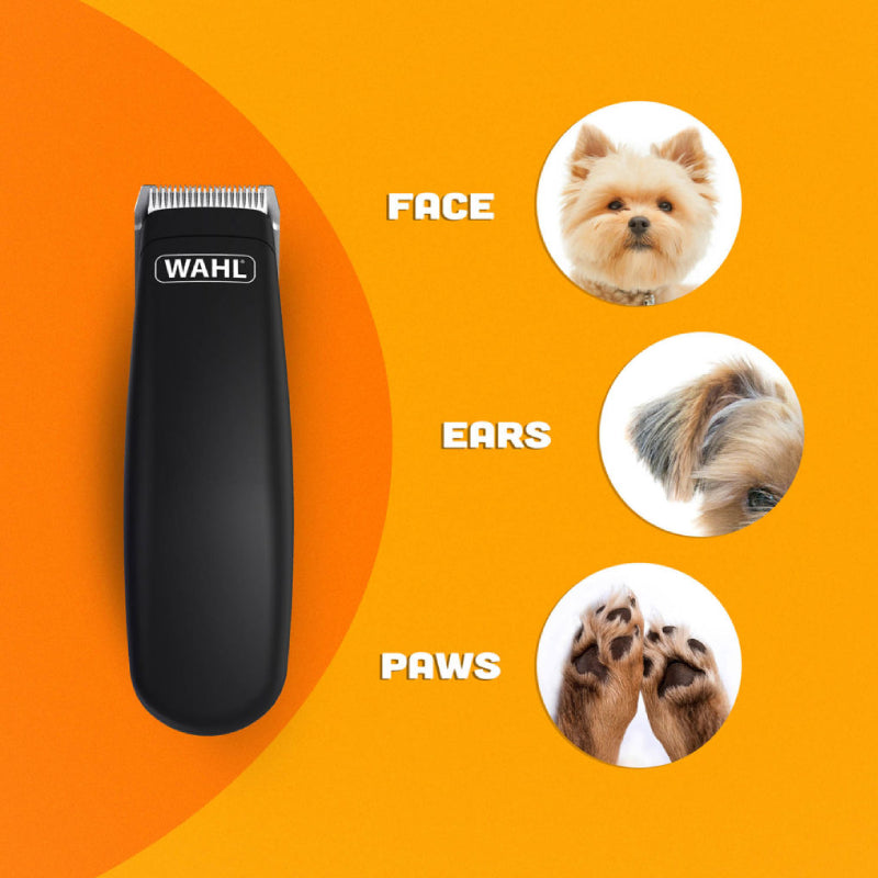Wahl Pocket Pro Animal Trimmer Black for pets shown with dog's face, ear, paws on orange.