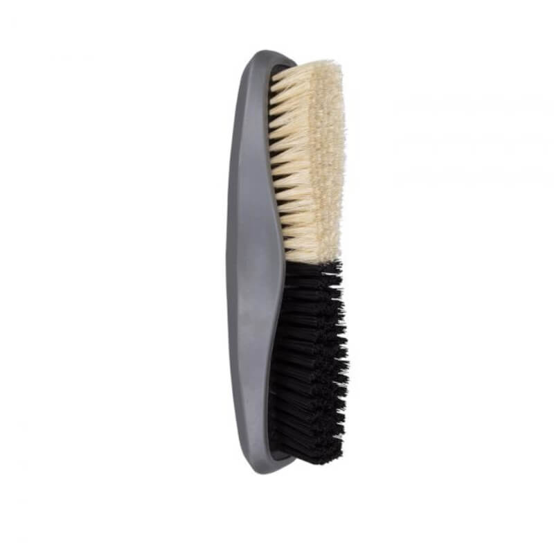 The Wahl Body Brush Combo has soft white bristles on one side and stiff black bristles on the other.