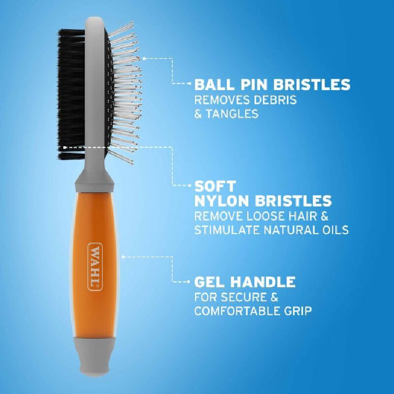 Wahl Double Sided Brush with orange gel handle and soft bristles, by Wahl.