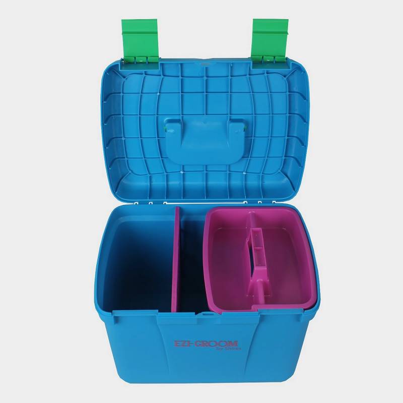 Ezi-Groom Deluxe Grooming Box Baby Blue with green hinges and a pink removable tray inside.