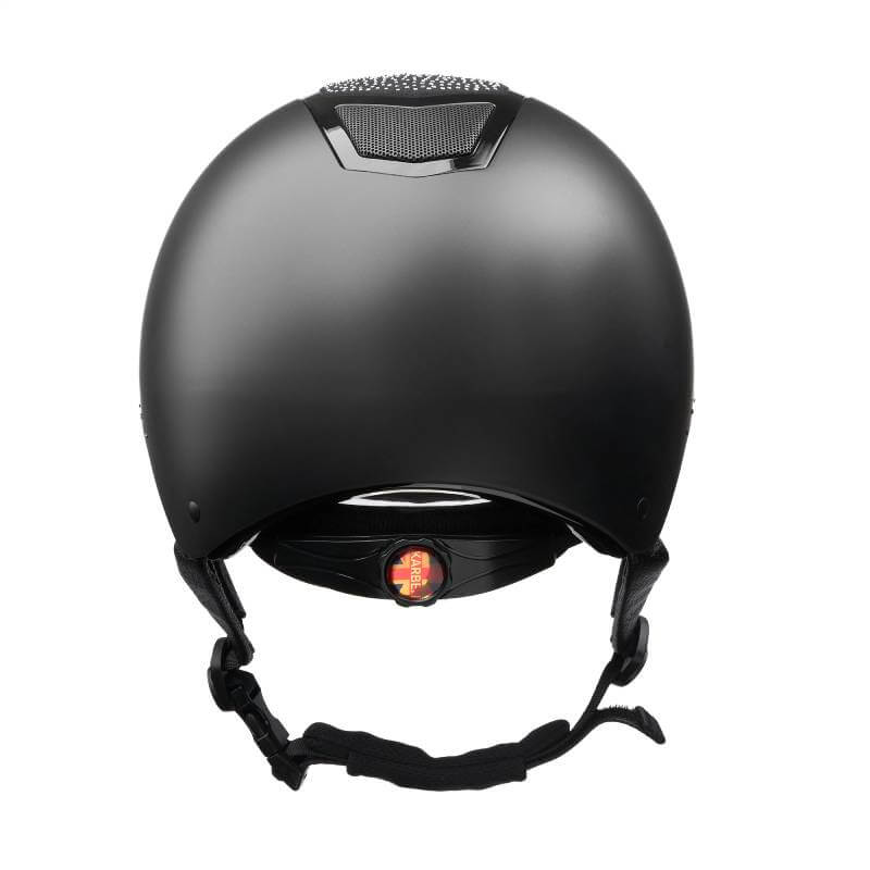 Karben Stella Riding Hat Black by Karben, shown from the back with chin strap on white background.