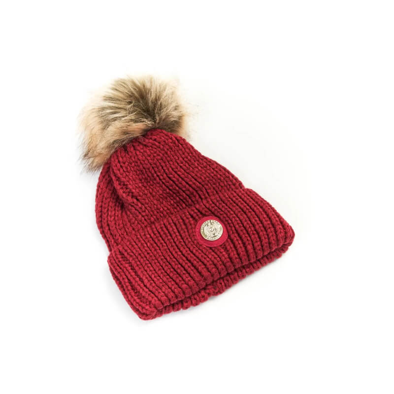 Aubrion Team Winter Hat Red: Red beanie with faux fur pom pom and round metal emblem by Aubrion.