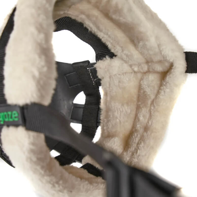 Close-up of Shires FreeGraze AirFlow Grazing Muzzle with beige faux fur lining and strap.