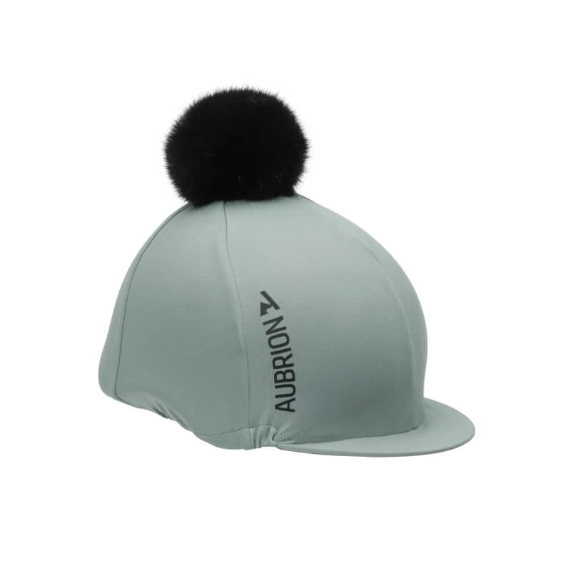 Sage Aubrion React Hat Cover with black pom-pom, perfect for equestrian style.
