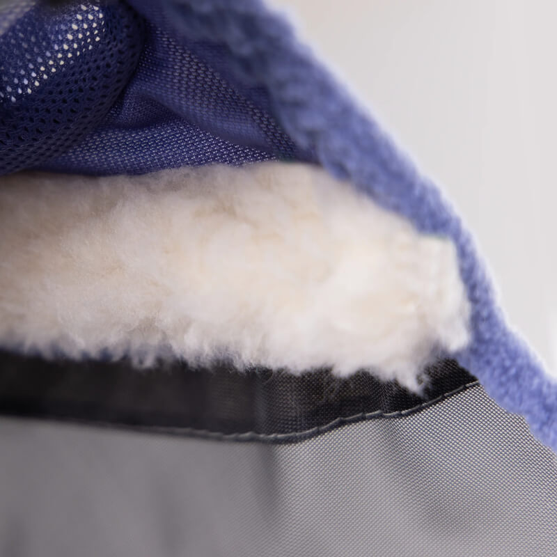 Close-up of Shires FlyGuard Pro Mesh Fly Mask with Ears Sky, soft fleece edge for horses.