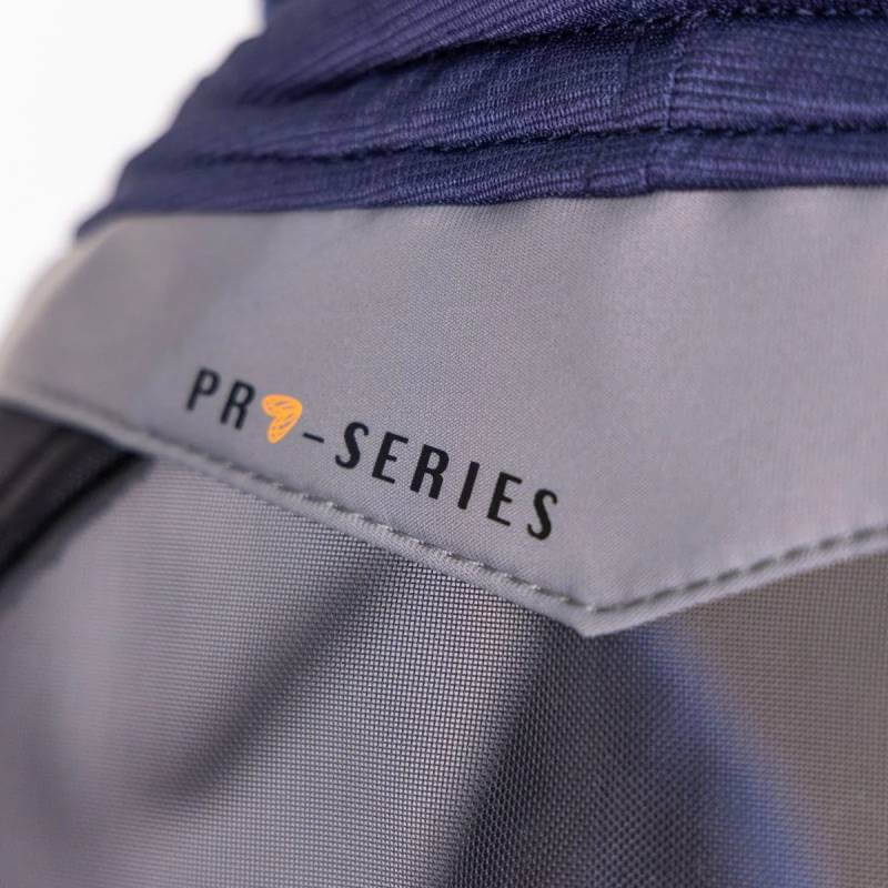 Close-up of a Shires FlyGuard Pro Fine Mesh Fly Mask with Ears & Nose label, navy color.