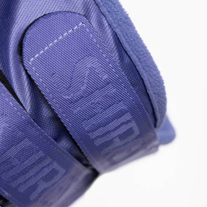 Close-up of Shires FlyGuard Fine Mesh Fly Mask with purple AIR strap, mesh material shown.
