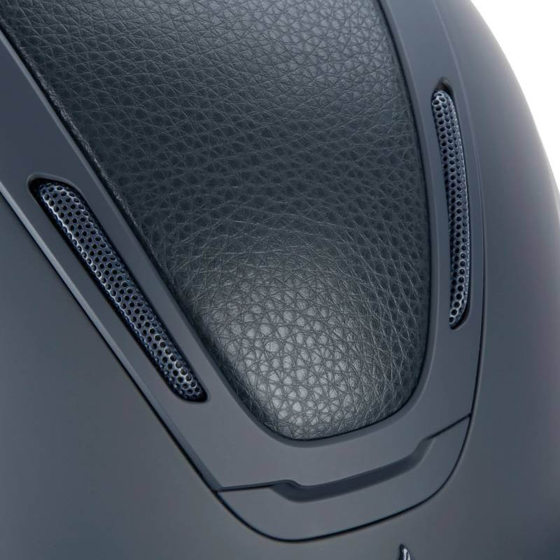 Close-up of mesh vents on the Shires Karben Amity LTHR Riding Hat Navy equestrian helmet.