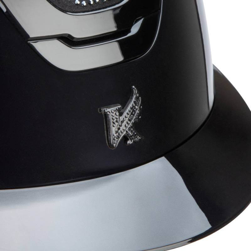 Close-up of the Shires Karben Amity SPKL Riding Hat Black with a raised K logo on the front.