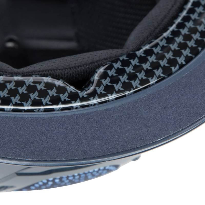 Close-up of the Shires Karben Amity SPKL Riding Hat Navy with patterned edge and padded interior.