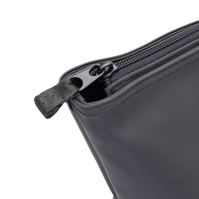 Close-up of the Aubrion React Tote Bag Black with a matching black fabric zipper pull.