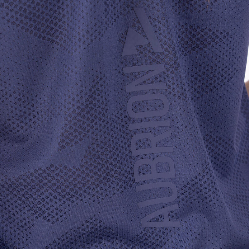 Close-up of Aubrion React Tech T-Shirt Midnight with AUBRION and arrow logo printed vertically.