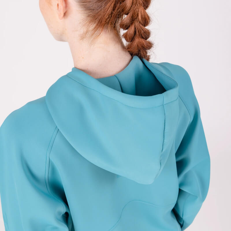 Person with a red braid in an Aubrion React Quarter Zip Hoodie Haze, facing away from camera.