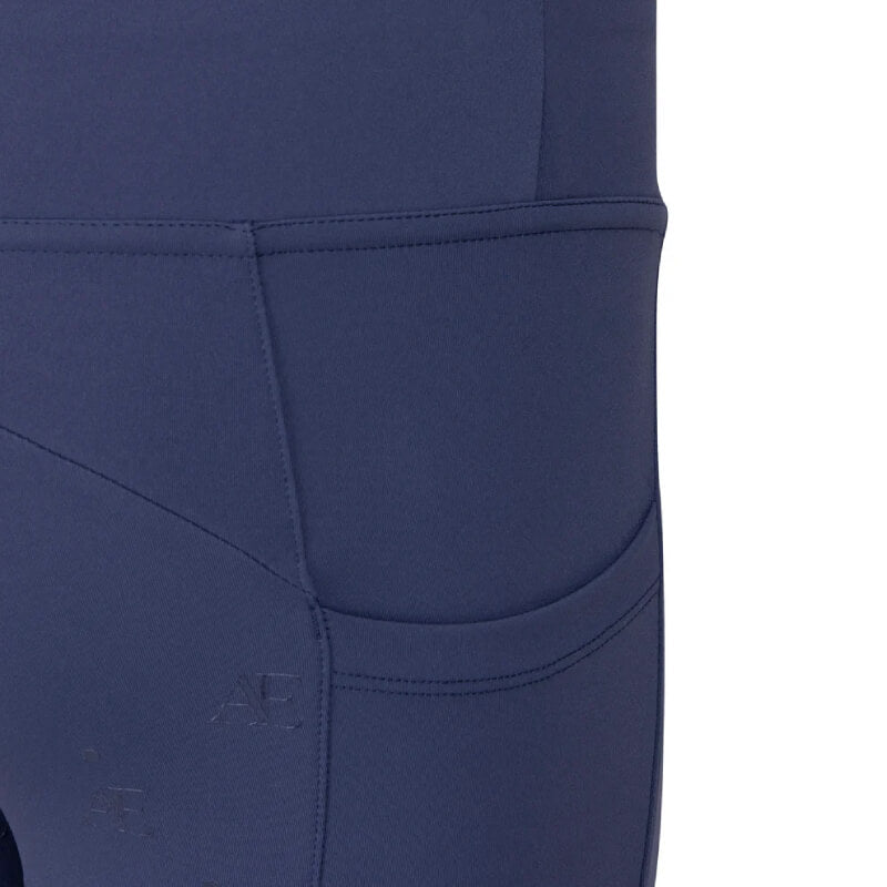 Close-up of Aubrion Equestrian Young Rider Riding Tights Midnight with side pocket and logo.