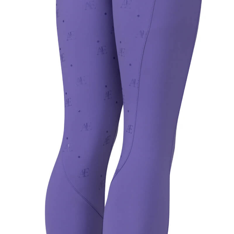 Aubrion Young Rider Tights in heather, with dots and letters—perfect for young equestrians.