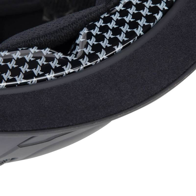 Close-up of the Shires Karben Amity SMRT Riding Hat Black with white bird pattern lining.