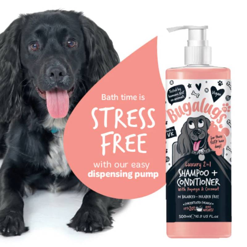 A black dog sits next to Bugalugs 2in1 Papaya Coconut Dog Shampoo & Conditioner 250ml.
