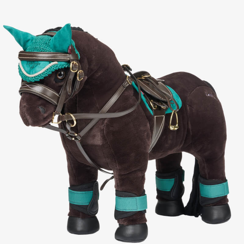 LeMieux Toy Pony in Evergreen Fly Hood with matching teal and brown riding gear and leg wraps.