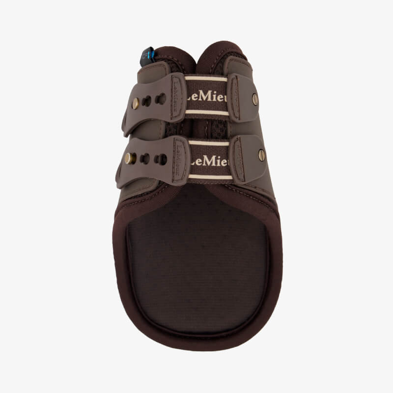LeMieux Exo-Flex Fetlock Boot Brown/Gold with two straps and studs for tendon protection.