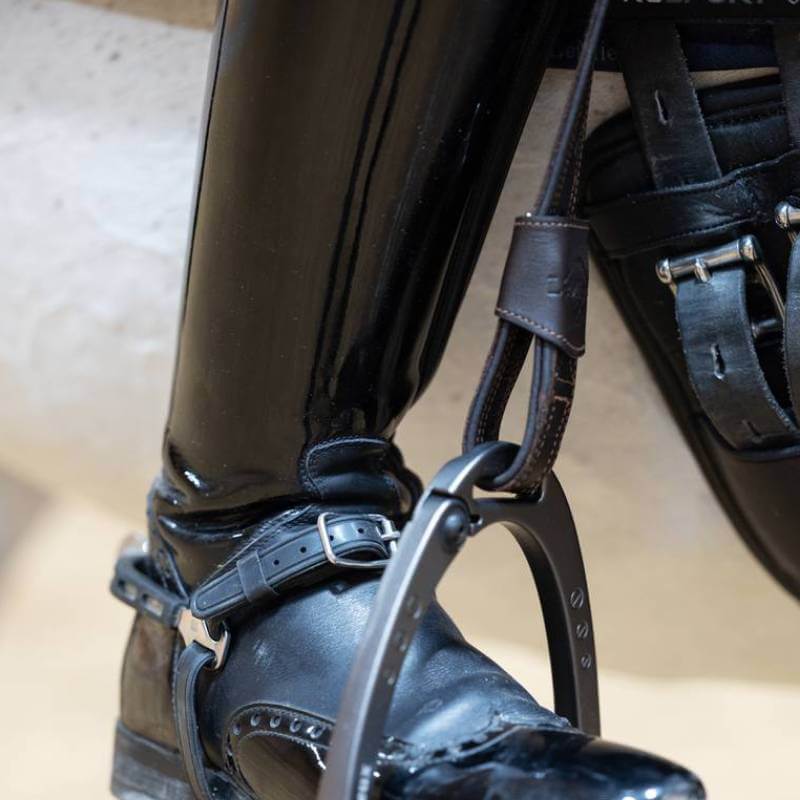 LeMieux Vector Close Contact Stirrup Leather Brown, stitched and adjustable, isolated on white.