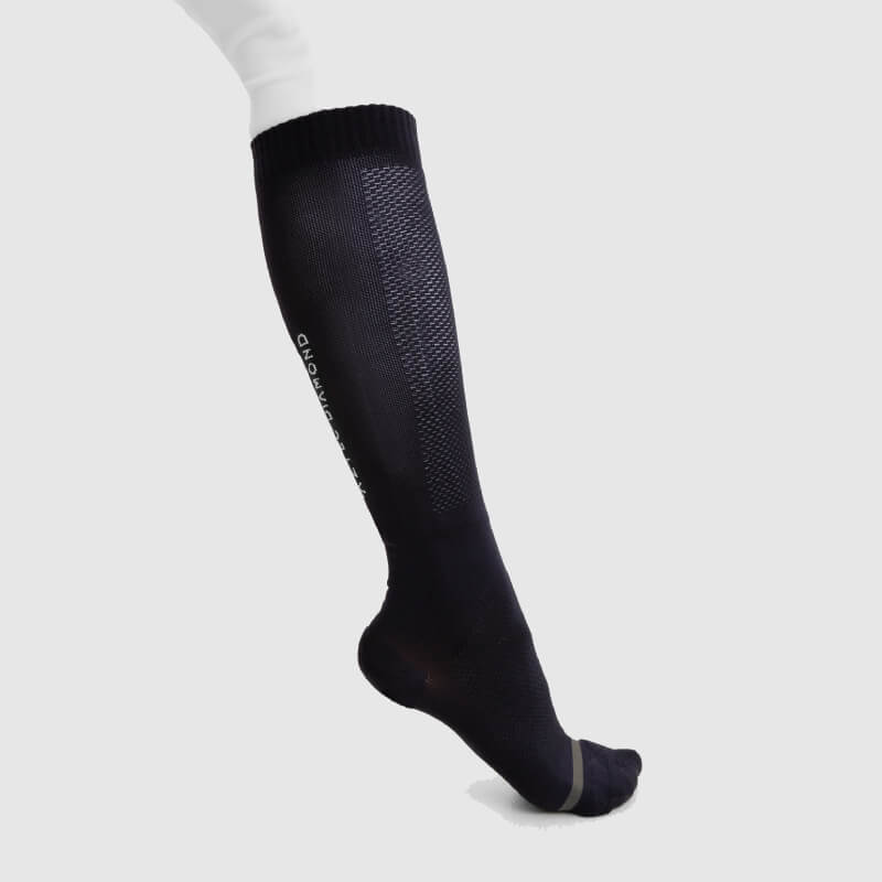 Aztec Diamond Technical Sock Navy on a mannequin leg, displayed against a white background.