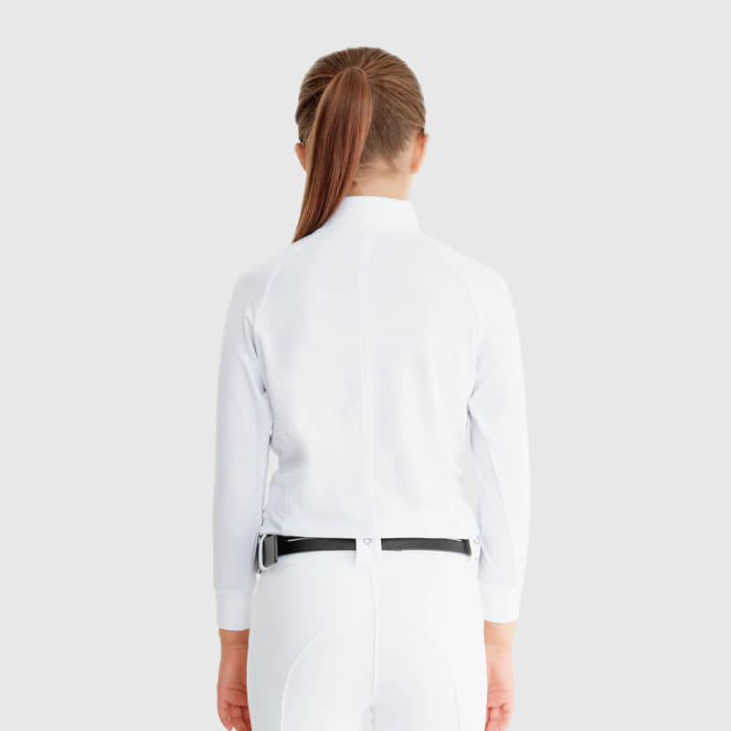 A person with a ponytail stands wearing the Aztec Diamond YR Mesh Shirt White and a black belt.
