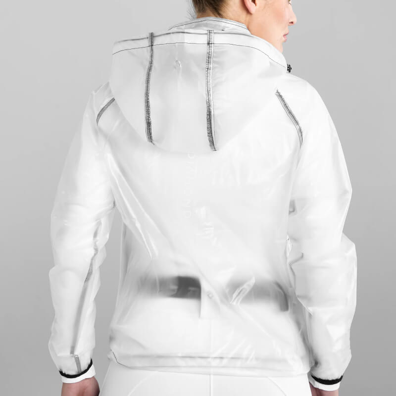 Person in Aztec Diamond Rain Jacket Clear faces away, highlighting translucent back details.