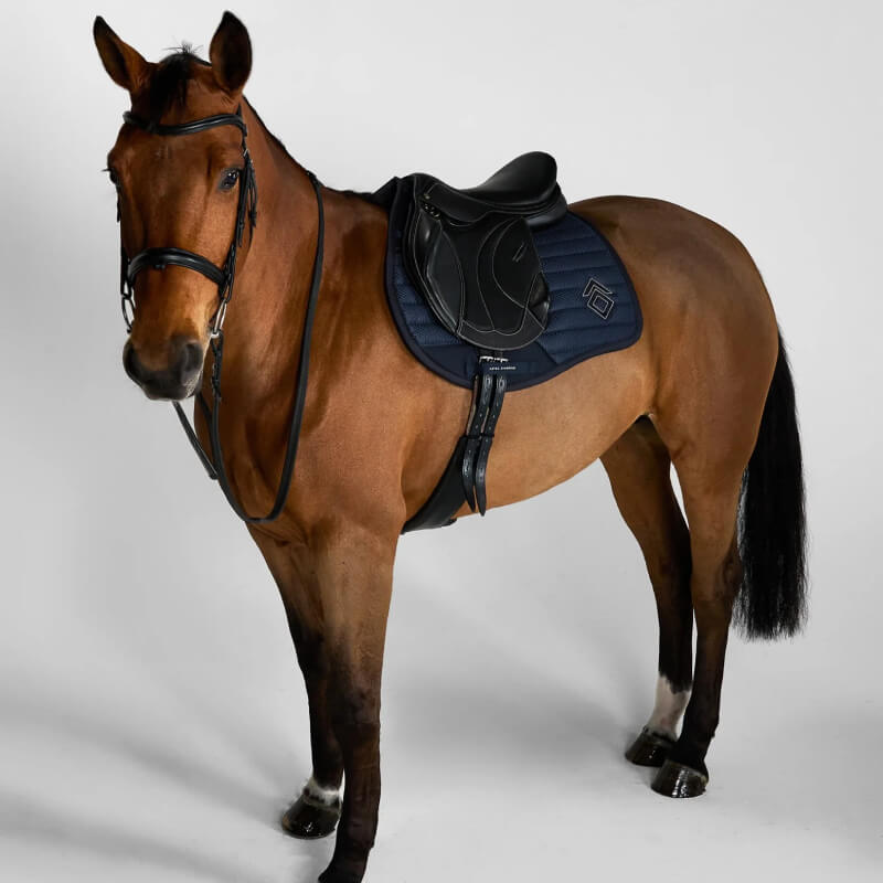 Brown horse with Aztec Diamond Mesh Saddle Cloth Jump Cut Navy, on a white background.