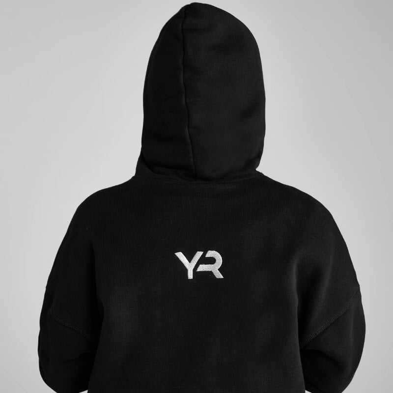 Person in an Aztec Diamond YR Pull On Hoodie Black/Pink, heavyweight jersey style, back view.